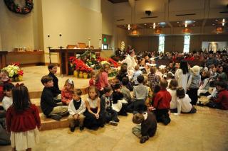 Children at Alter 12-24-11.JPG